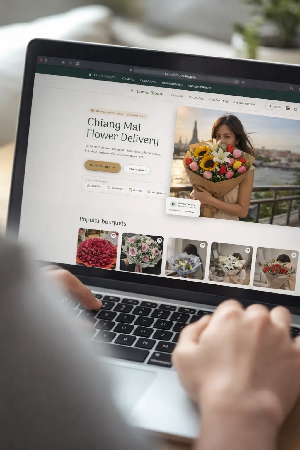 Lanna Bloom website shown on a laptop